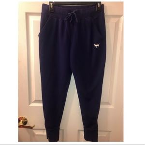 Pink Sweatpants w/ zippers on ankles of pants.